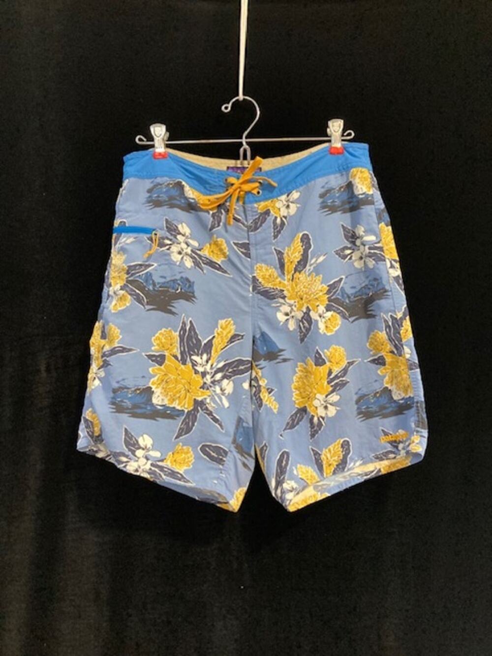 Patagonia Worn Wear men's floral print board shorts.